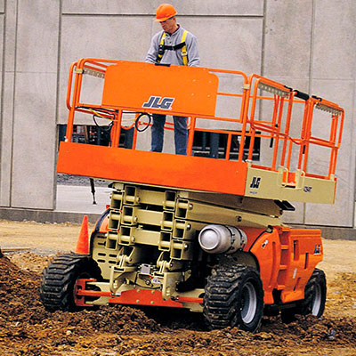 Image shoing a JLG Scissor Lift being operated on a building site